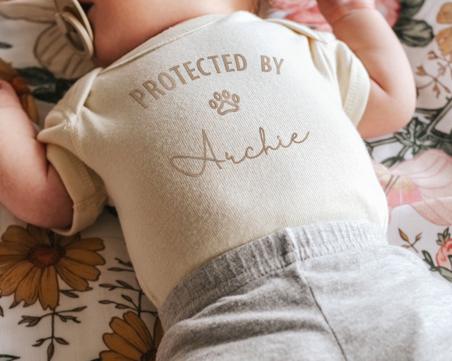 Protected by Dog Embroidered Bodysuit